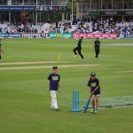 ......show that cricket is a game for all ages, as the New Zealand team warm up behind